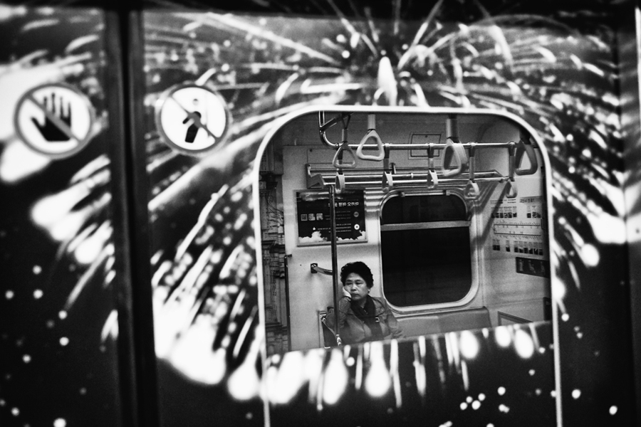 Reflections Inside The Seoul Metro